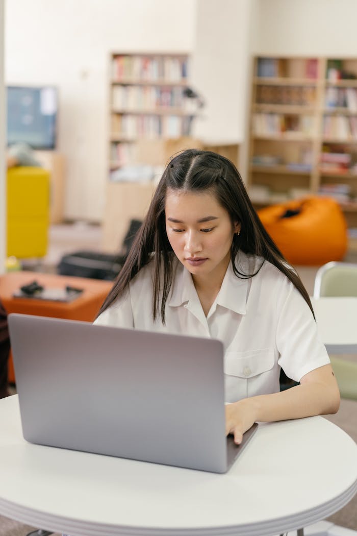 Female Student Using a Laptop